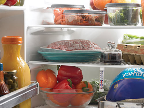 Photo: View into a filled refrigerator.