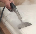 bed seam cleaning with hot steam application