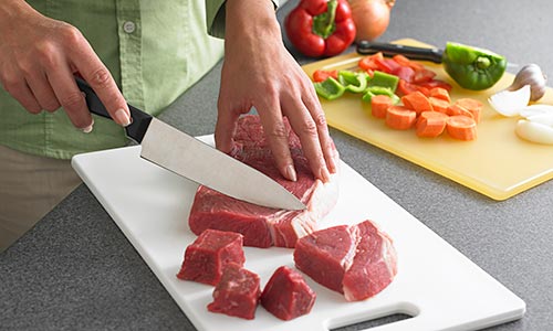 Separate cutting boards for food safety.