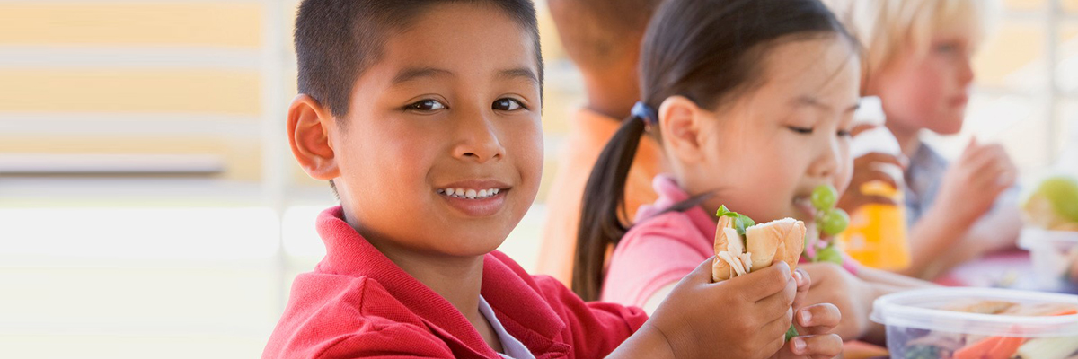 Children eating healthy food.