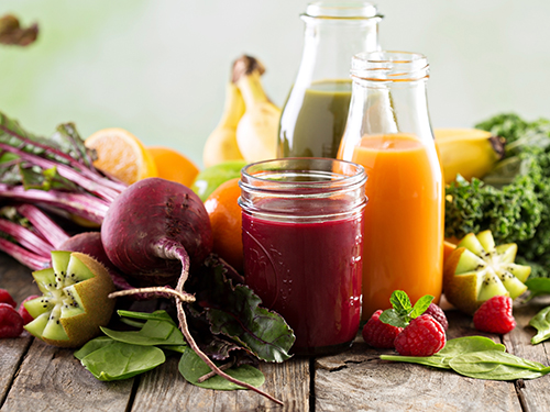 Photo: Three smoothies in glasses.