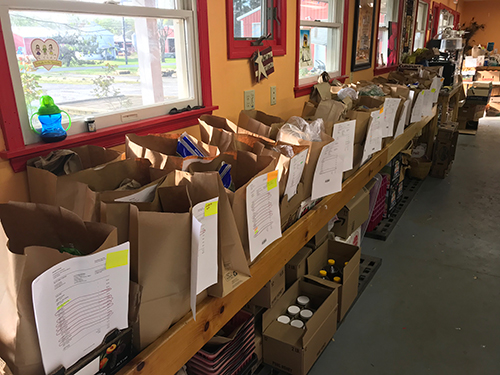 Photo: Packaged, bagged, pre-ordered produce.