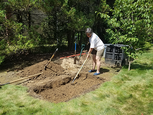 Preparing a raised bed.