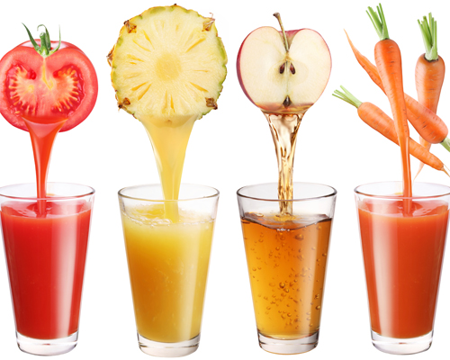 Photo: Fresh juice pours from fruits and vegetables.