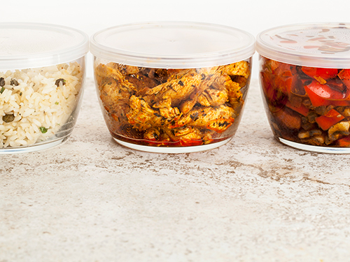Photo: Dinner meal in glass containers.
