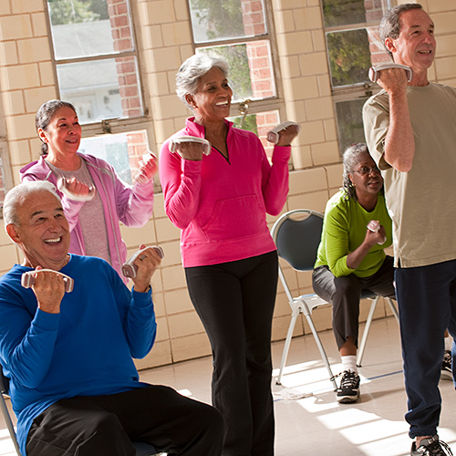 Photo of active seniors doing a light workout.